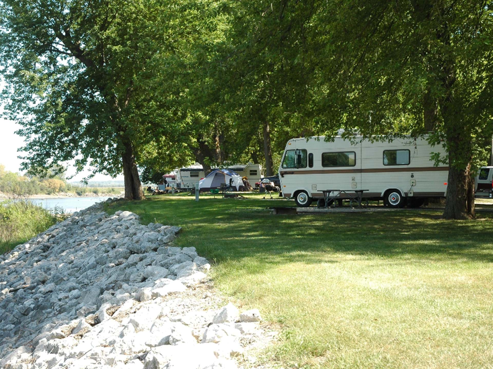 Campers along river at Ivans Campground