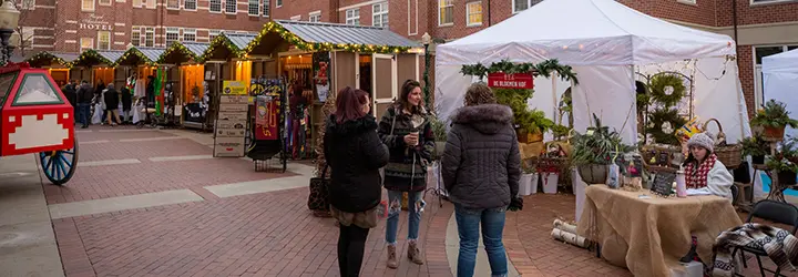 Downtown Iowa City's annual holiday market returns with local and festive  goods