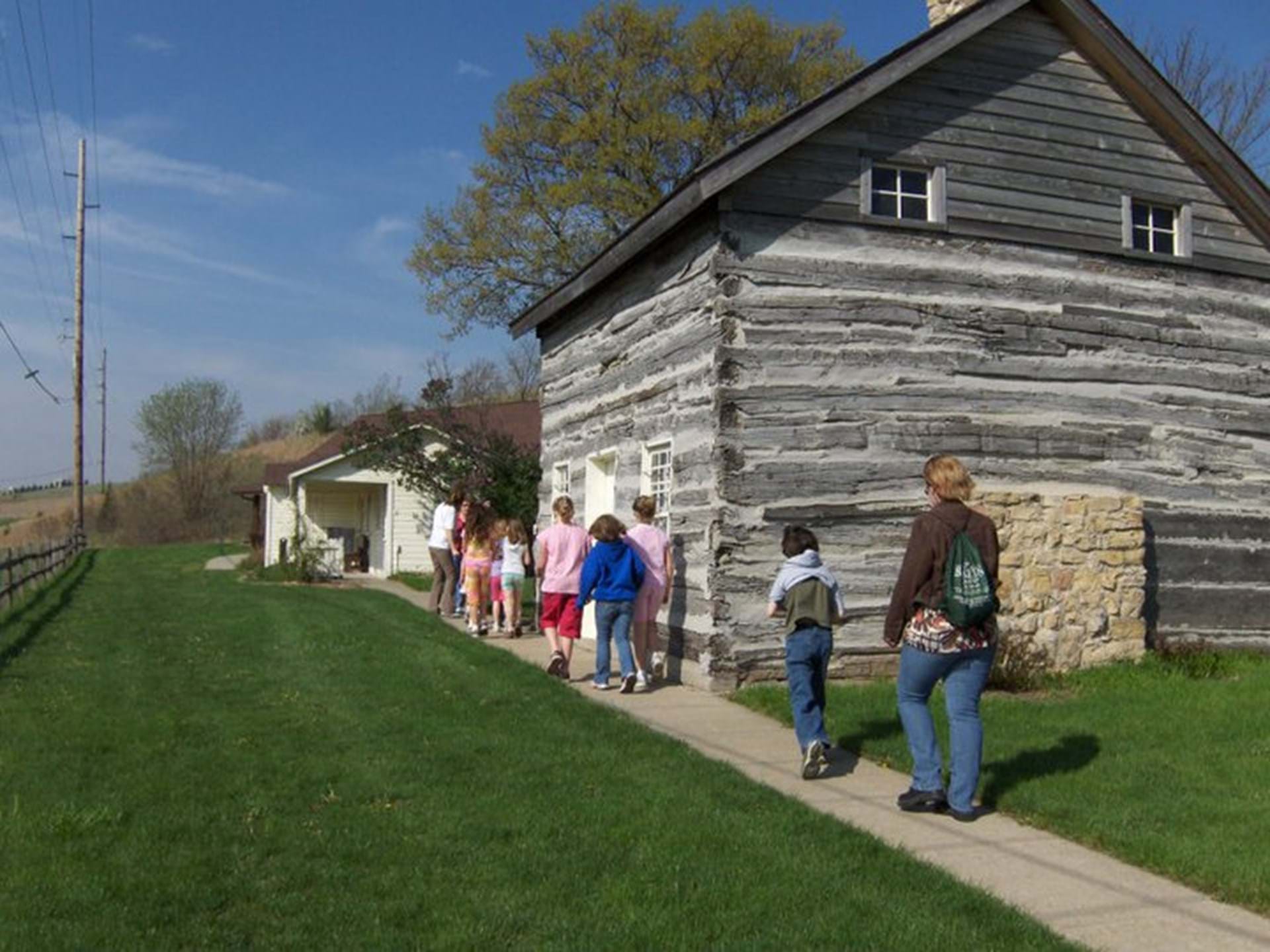Log Cabin and general store in the village