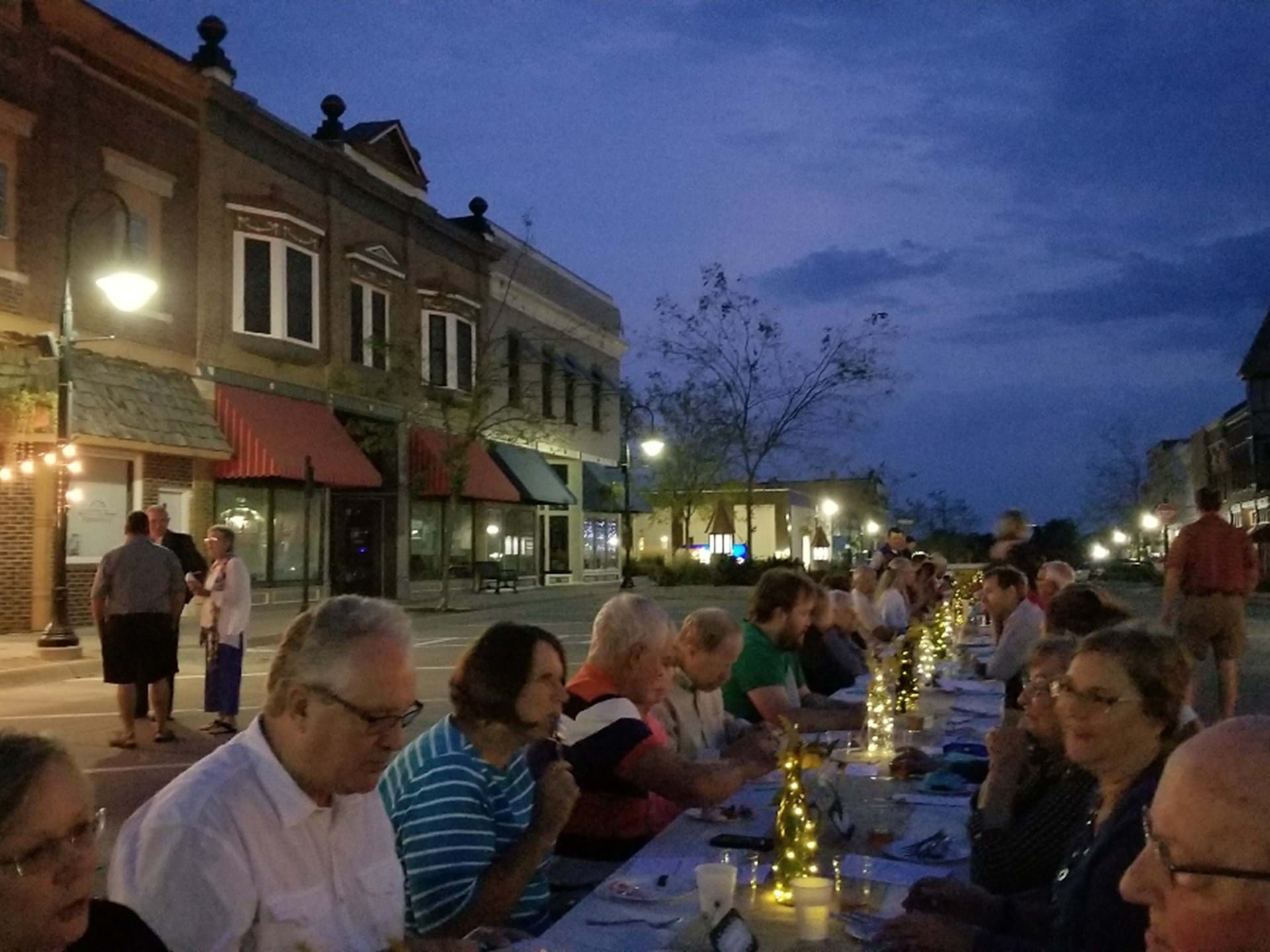 Diners enjoy the annual Avoca Main Street Longest Table; an outdoor, chef-hosted, five course meal procured from Avoca Main Street Farmers Market vendors and other local food producers.